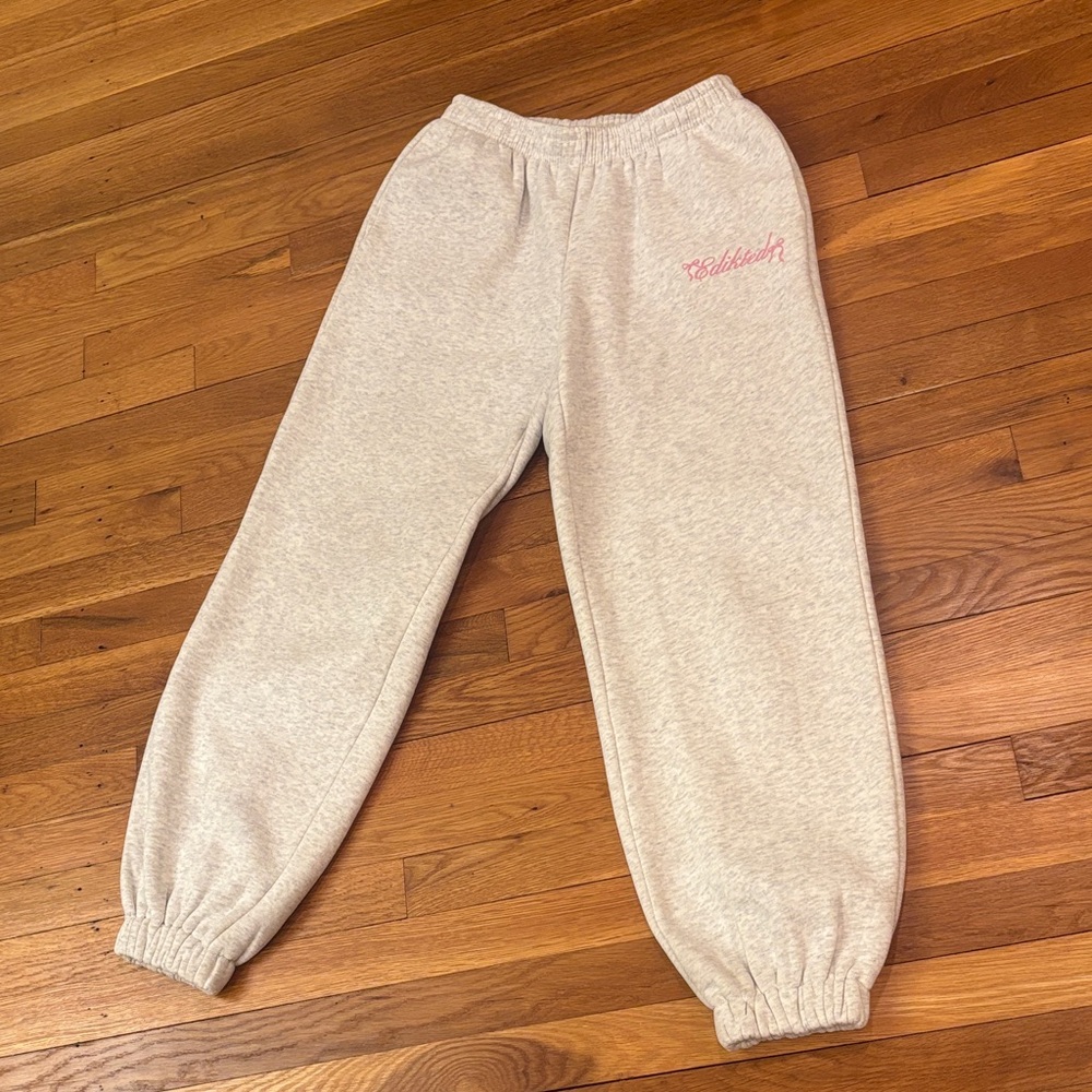 Edikted Gray Sweatpants with Pink Script Logo
